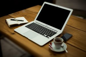 Table with laptop and coffee