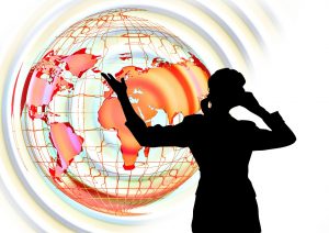 Woman silhouette with globe background